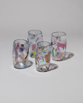 Group of Iridescent Nassau Cups on light color background.