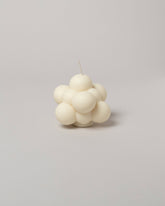  Andrej Urem Molecule Candle on light color background.