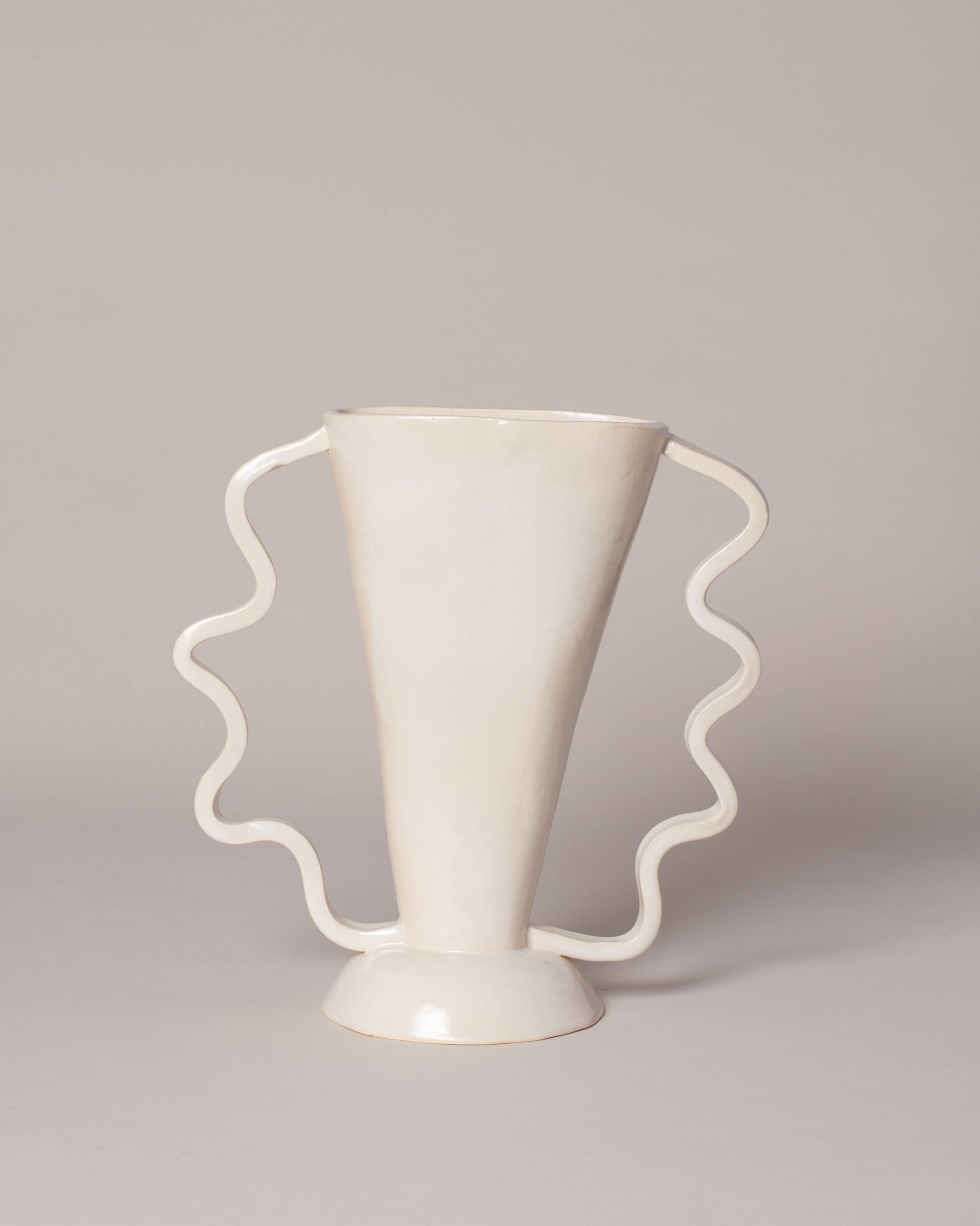 Morgan Peck Dandelion White Stretch Vase on light color background.