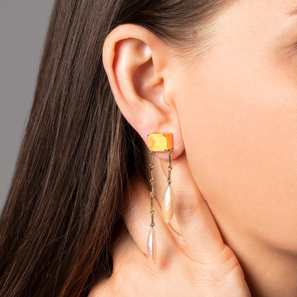 product_details::Lattice Earrings on model.