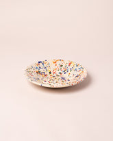 La Ceramica Vincenzo Del Monaco Colored Drops Shallow Bowl on light color background.