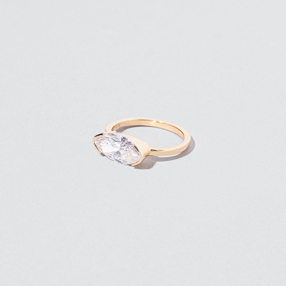 product_details:: Symmetry Ring on light color background.