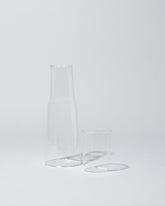 Detail view of the Ichendorf Milano Torre Night Bottle & Glass on light color background.