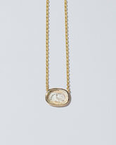  Grace Intaglio Seal Necklace on light color background.