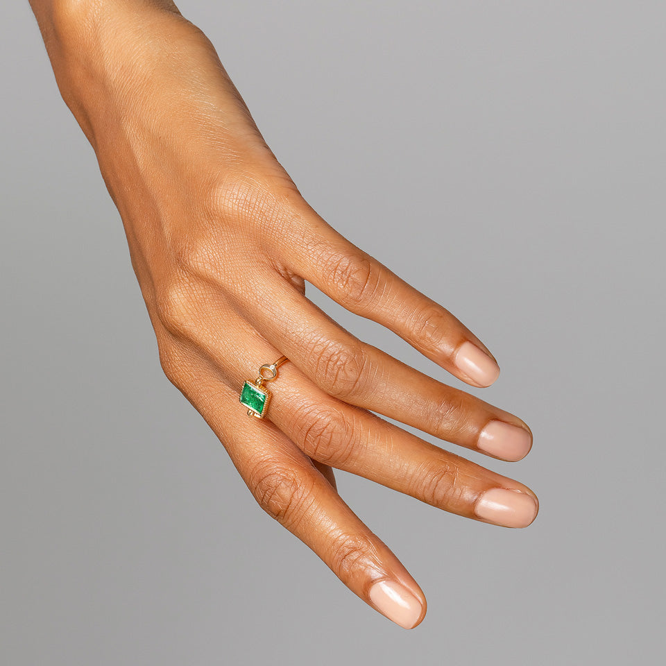 product_details::Emerald Moon Ring on model.