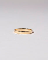 Gold 3mm Square Wire Band on light color background.
