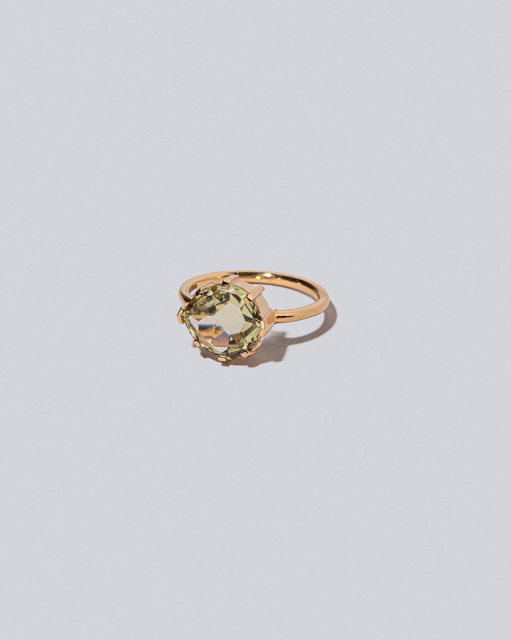 Product photo of the Warbler Ring on a light color background 