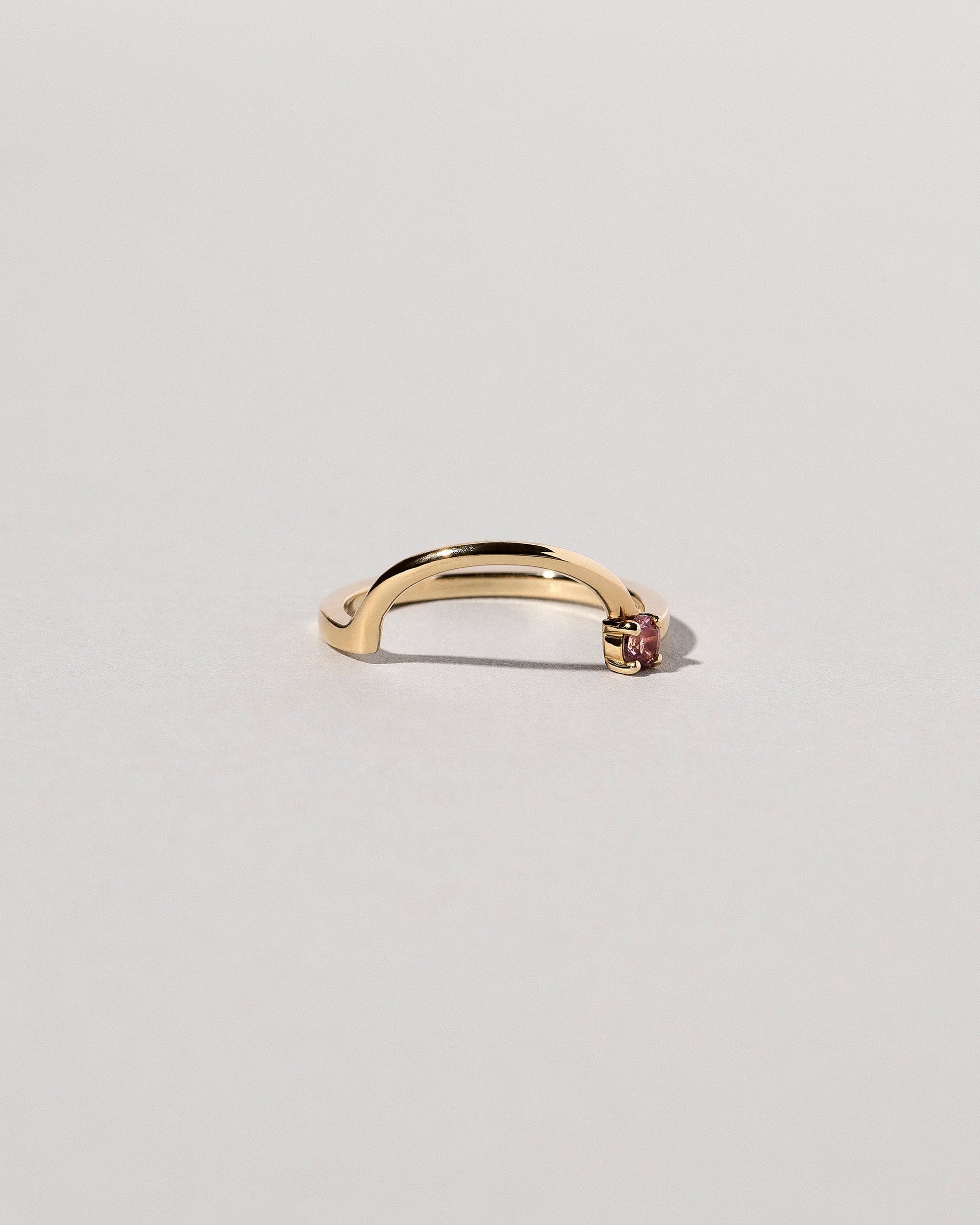 Yellow Gold Spinel Half Hoop Band on light color background.