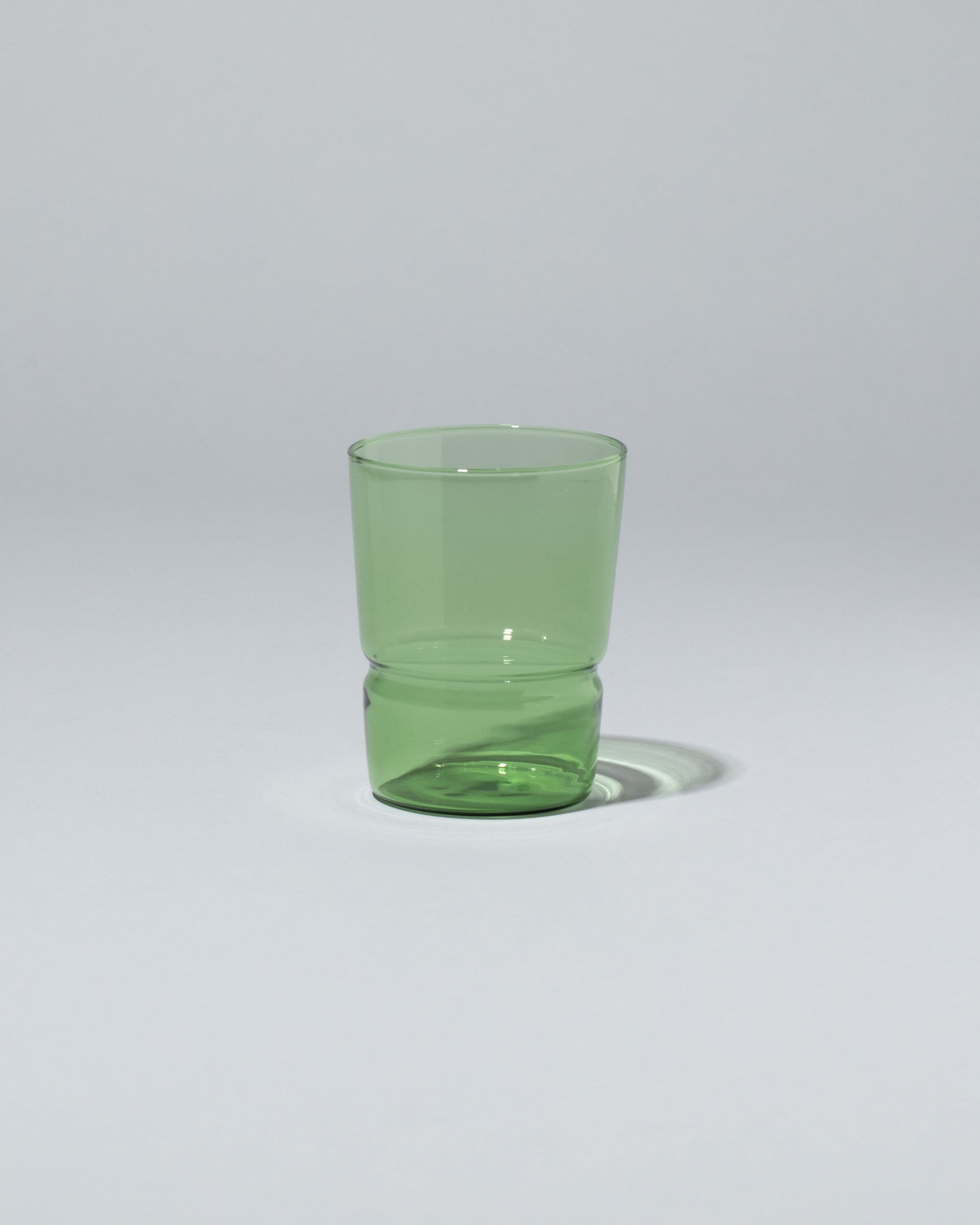 Ichendorf Milano Green TAP Glass on light color background.