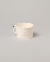 Eleonor Boström Bathtub Coffee Mug on light color background.