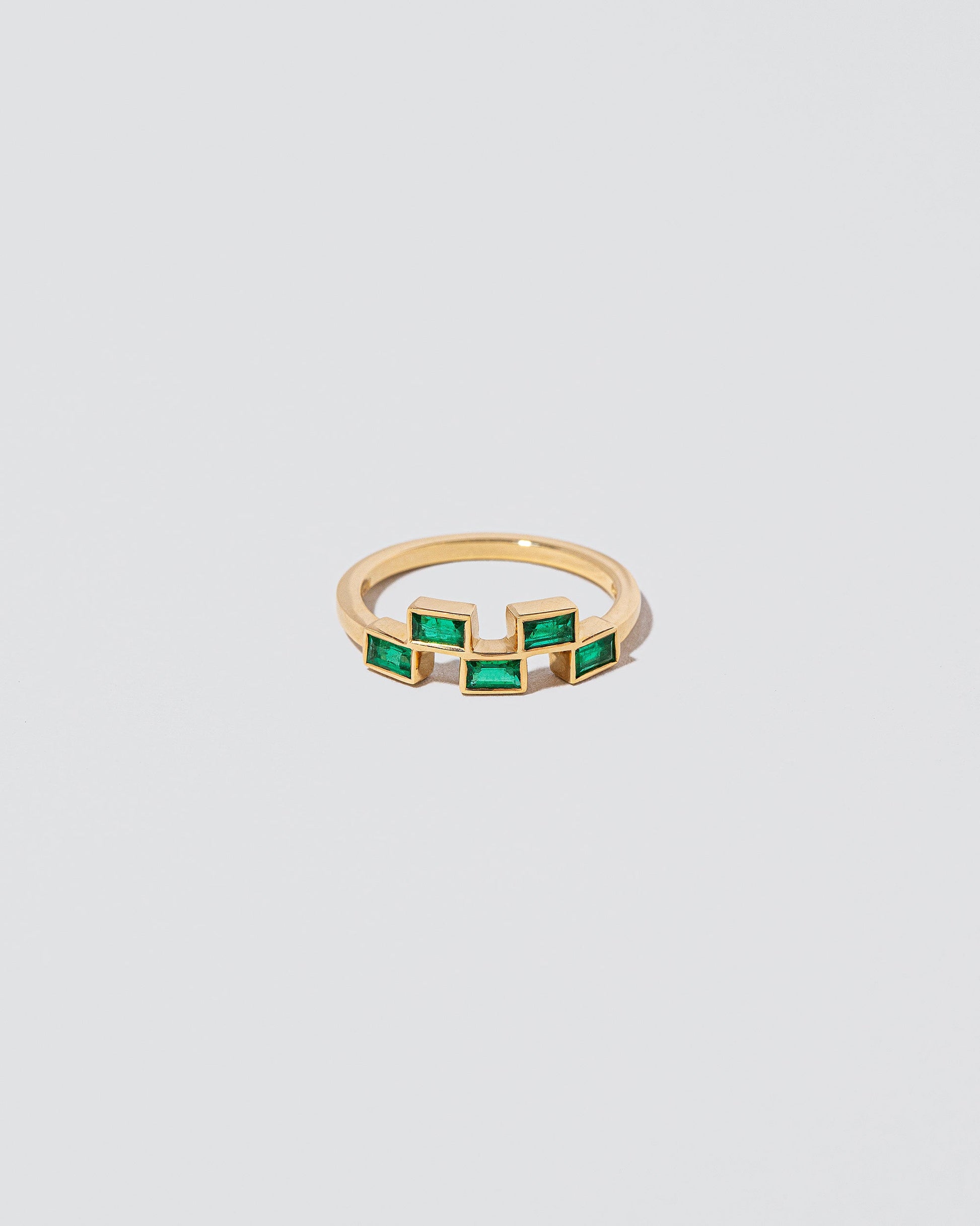 Emerald Brick Ring on light color background.