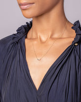 Cayo Necklace on model.