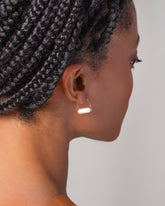 Pearl Hoop Earrings on model.