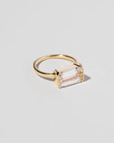  Emerald Cut Diamond Solitaire Ring on light color background.