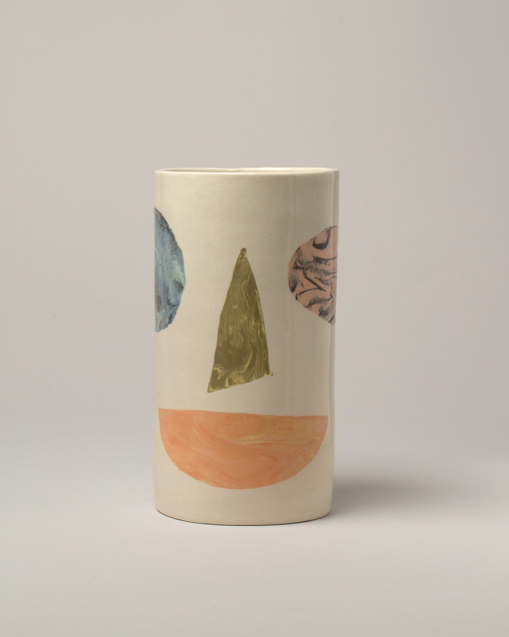 E.E. Ceramics Smiley Vase on light color background.