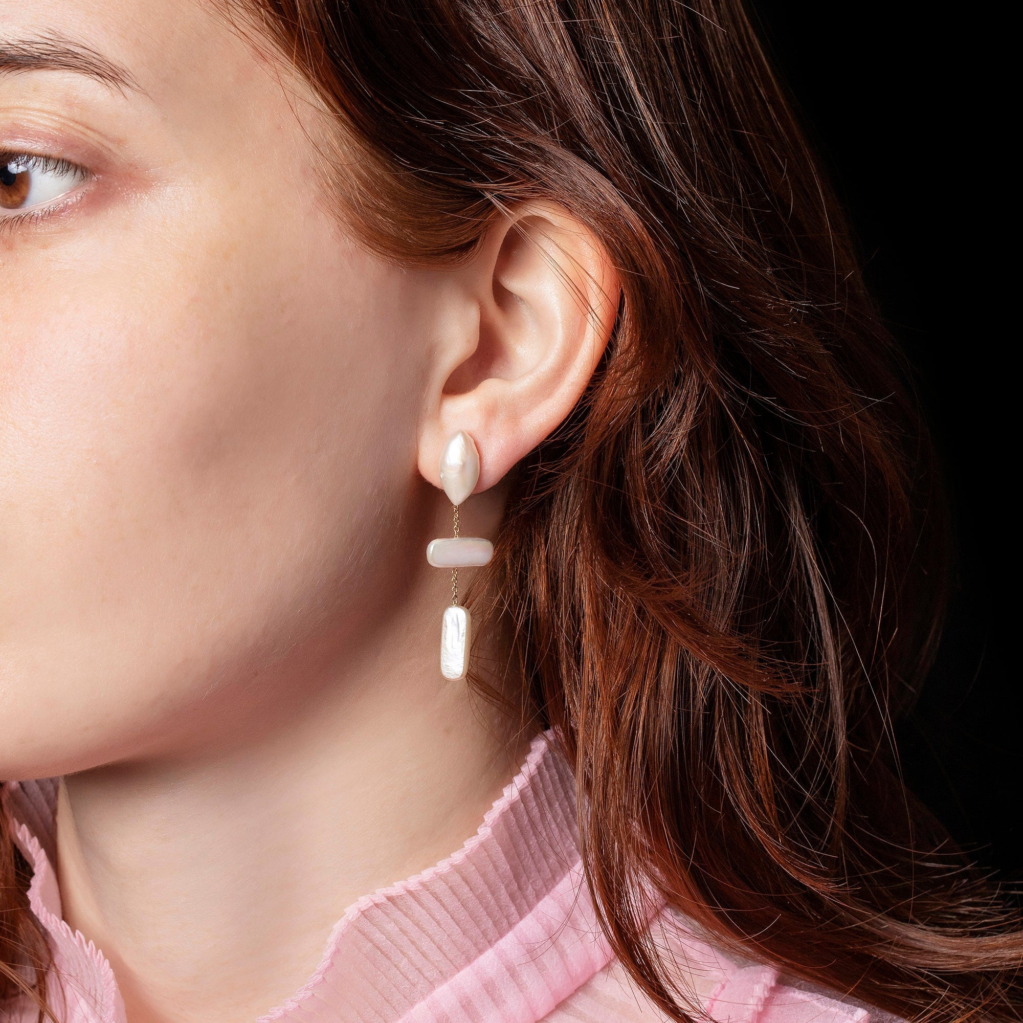 product_details::Nauplius Earrings on model.
