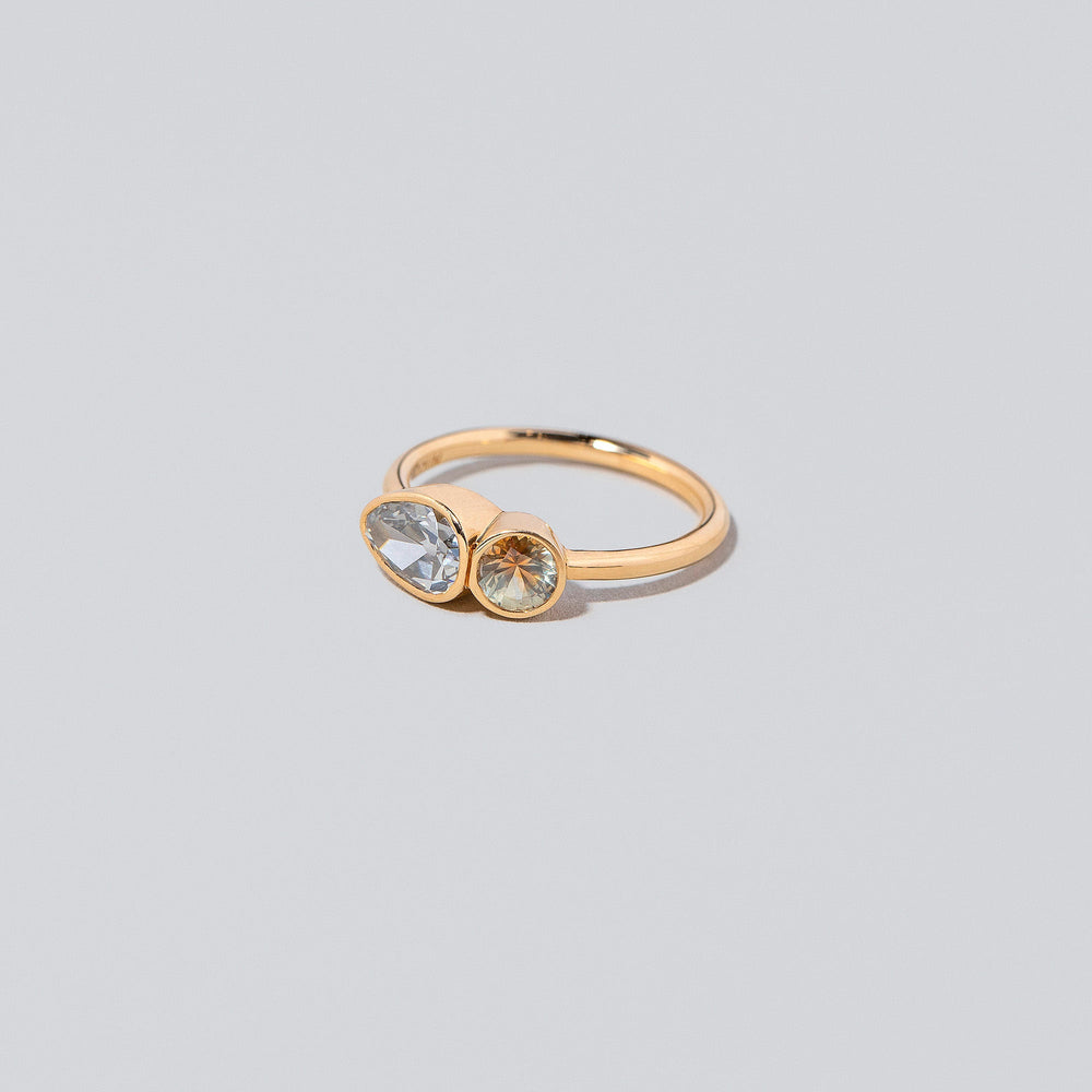 product_details:: Assal Ring on light color background.