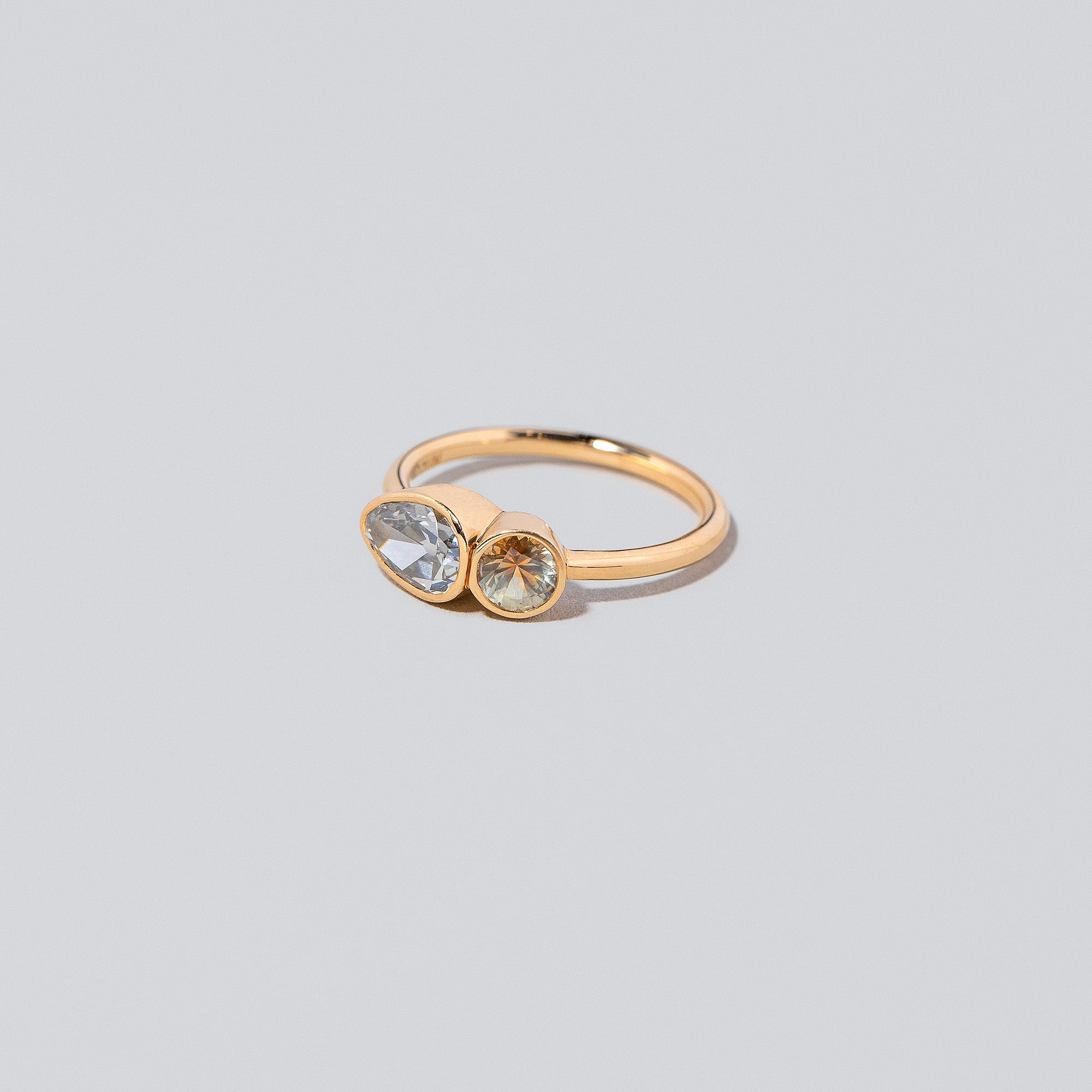 product_details:: Assal Ring on light color background.