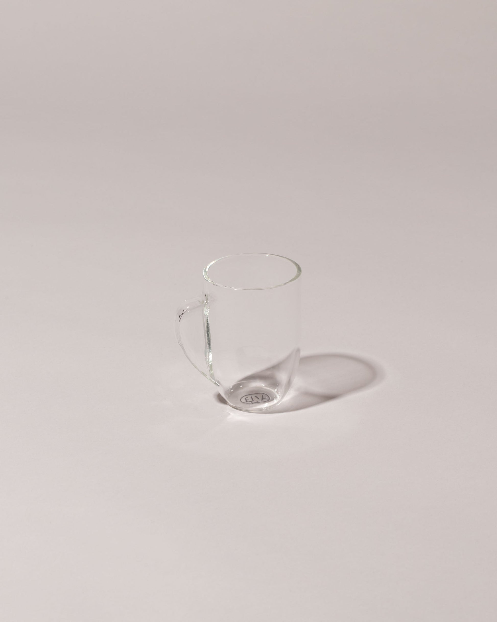 Laurence Brabant Glass Expansif Cup on light colored background.