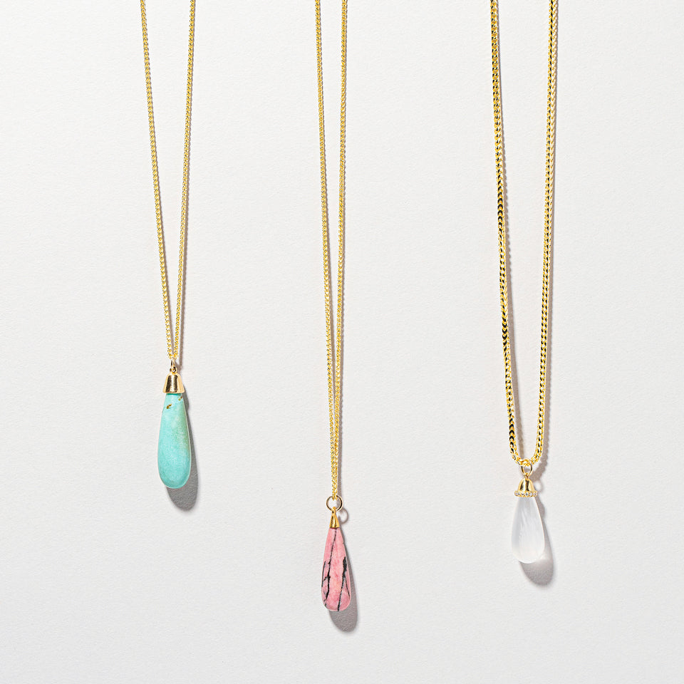 product_details:: Moonstone Drop Pendant on light color background.