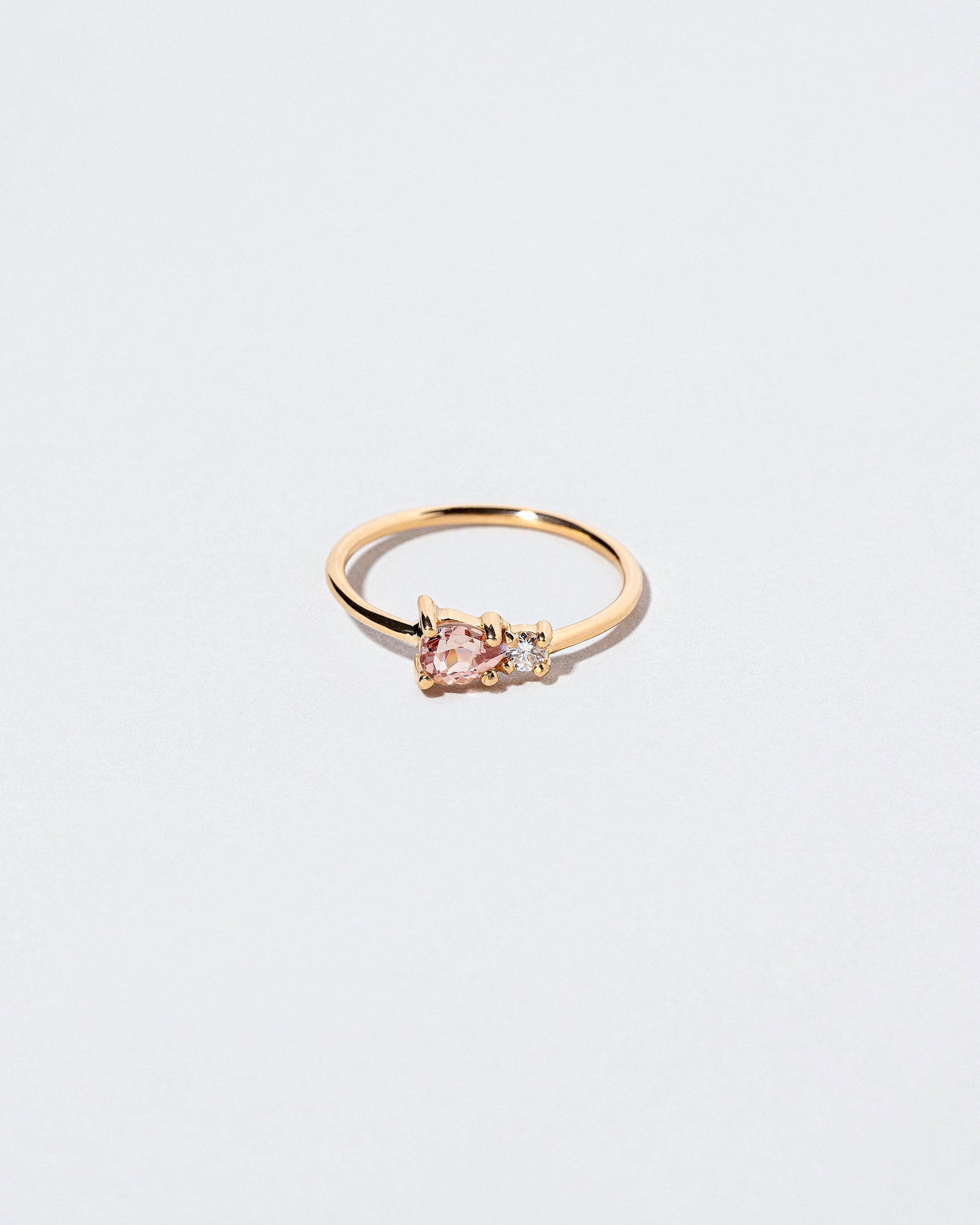  Teardrop Ring - Lotus Garnet on light color background.