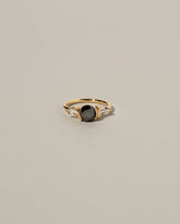 Black and White Diamond Ring on light color background.
