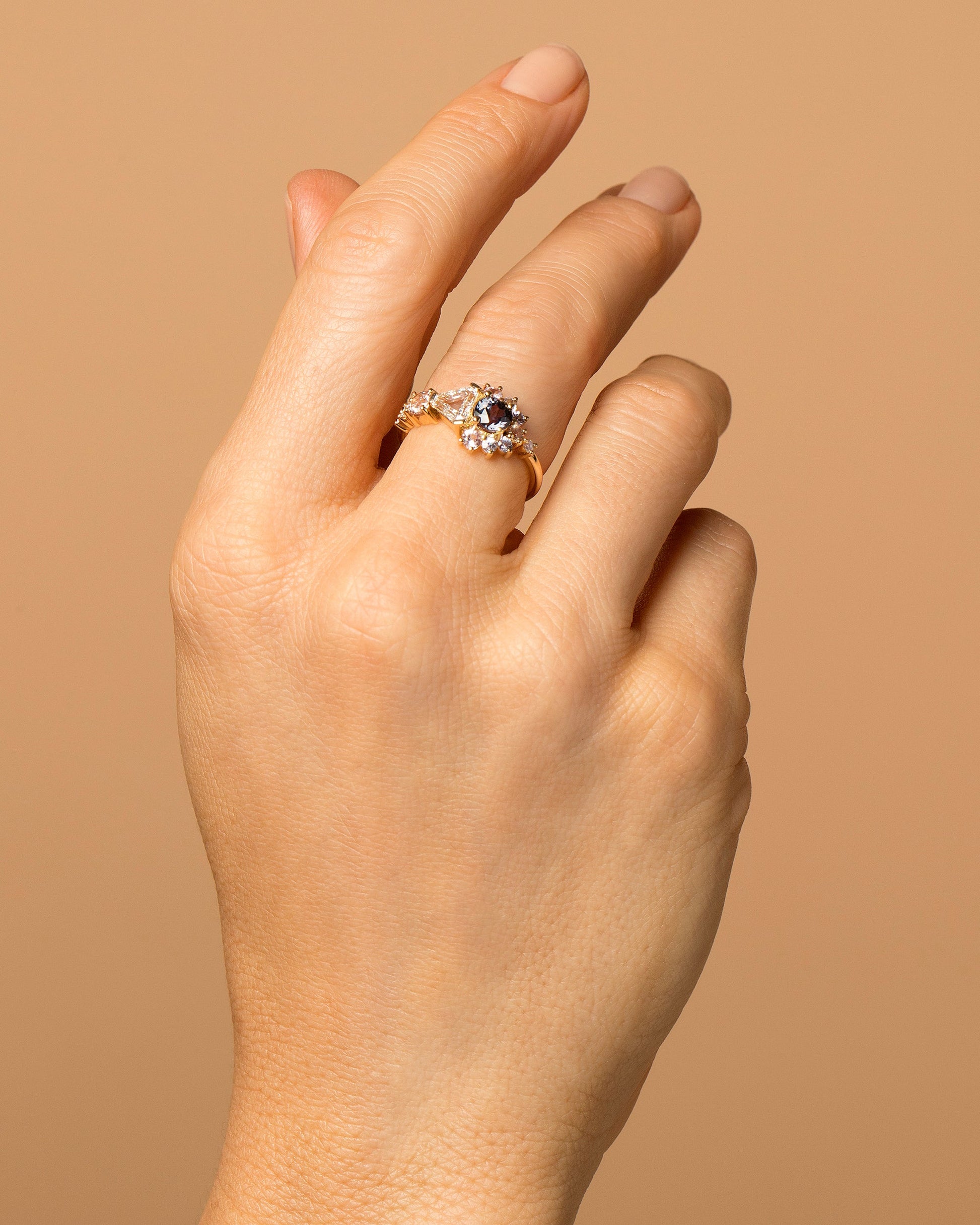 Diamond, Spinel & Sapphire Cluster Ring on model.