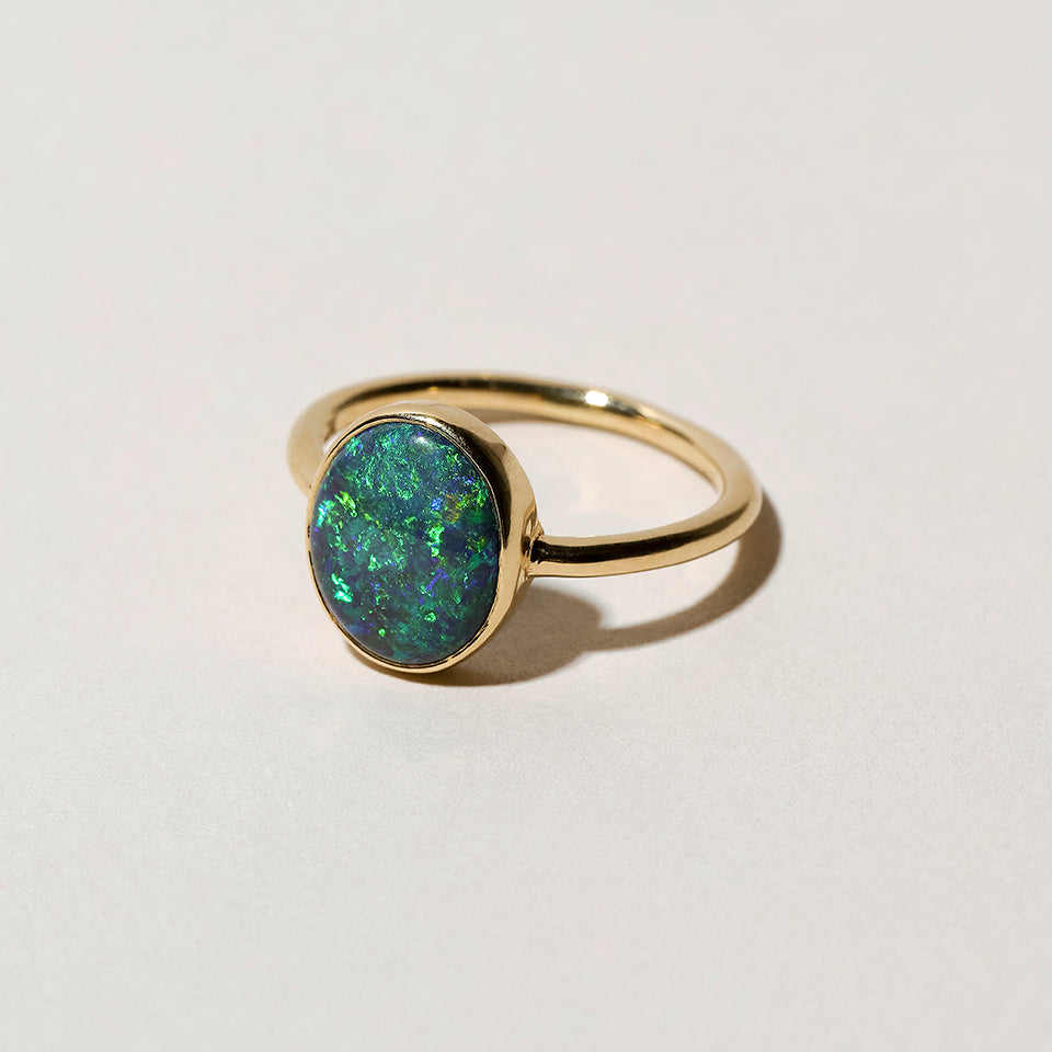 product_details:: Australian Black Opal Ring on light color background.