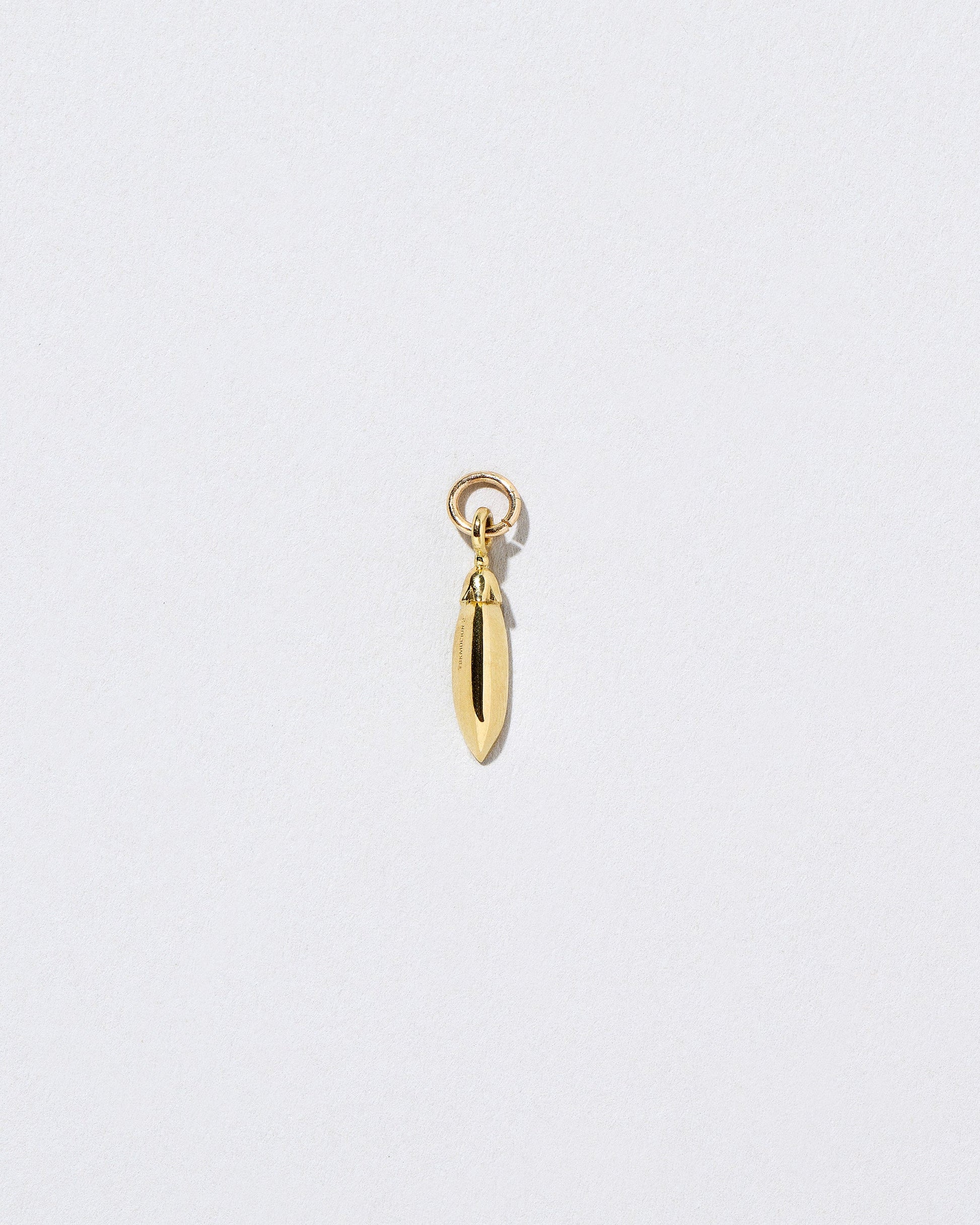  Snap Pea Charm on light color background.