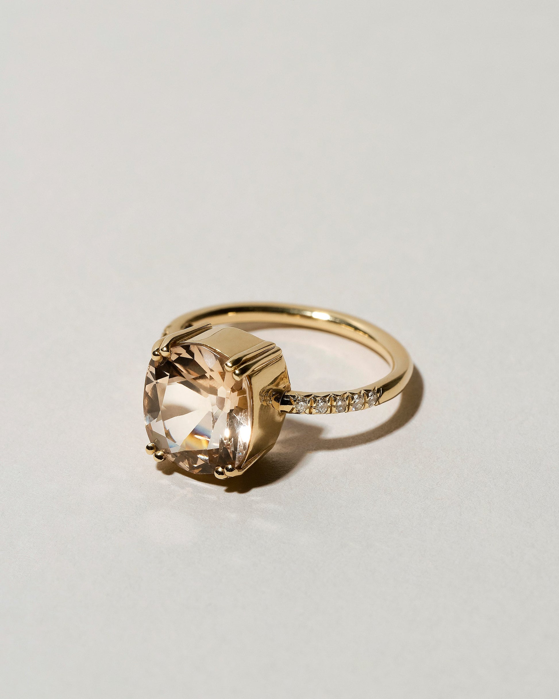  Morganite Solitaire Ring on light color background.