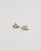 Tourmaline & Diamond Teardrop Earrings on light color background.