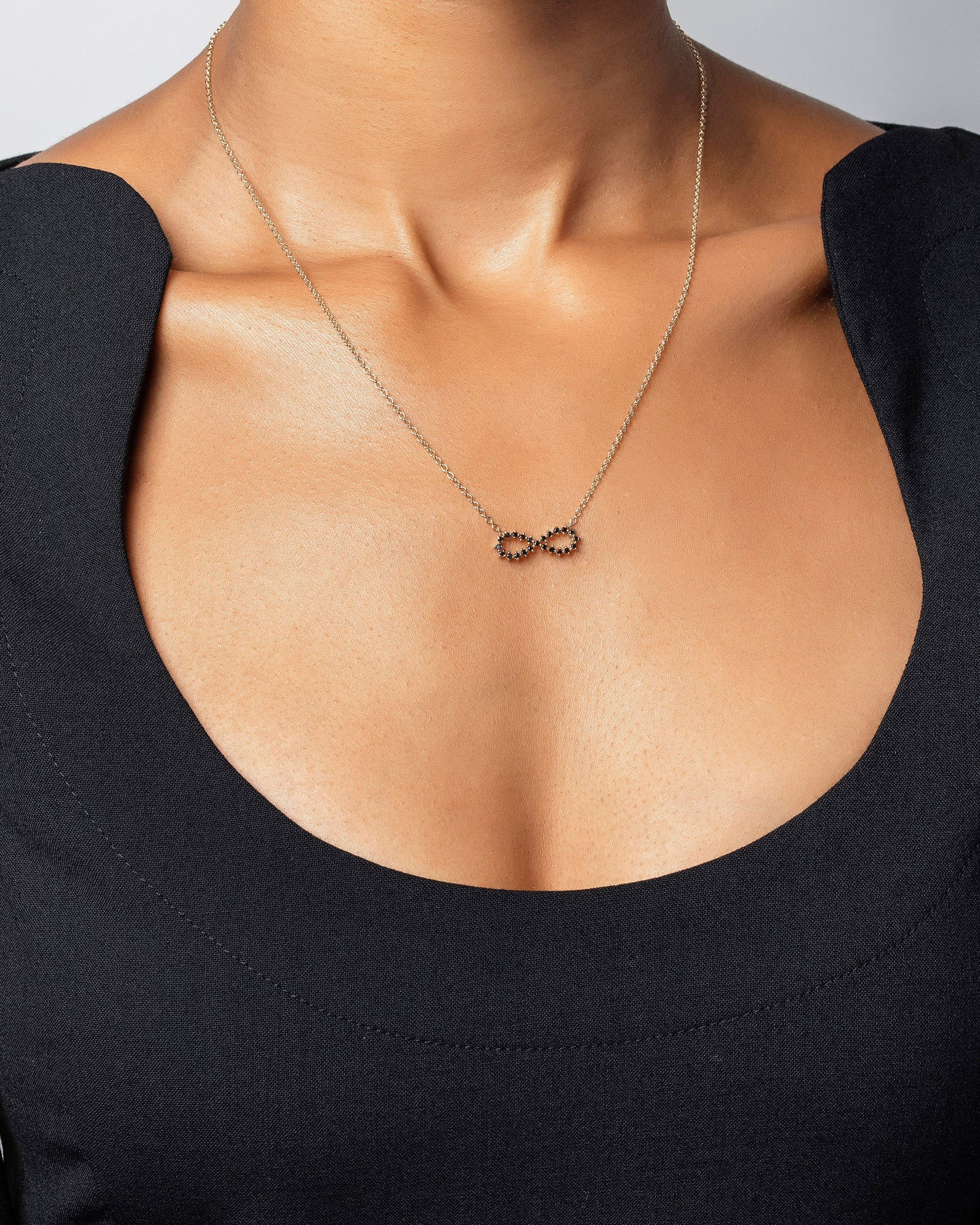 Infinity Necklace on model.