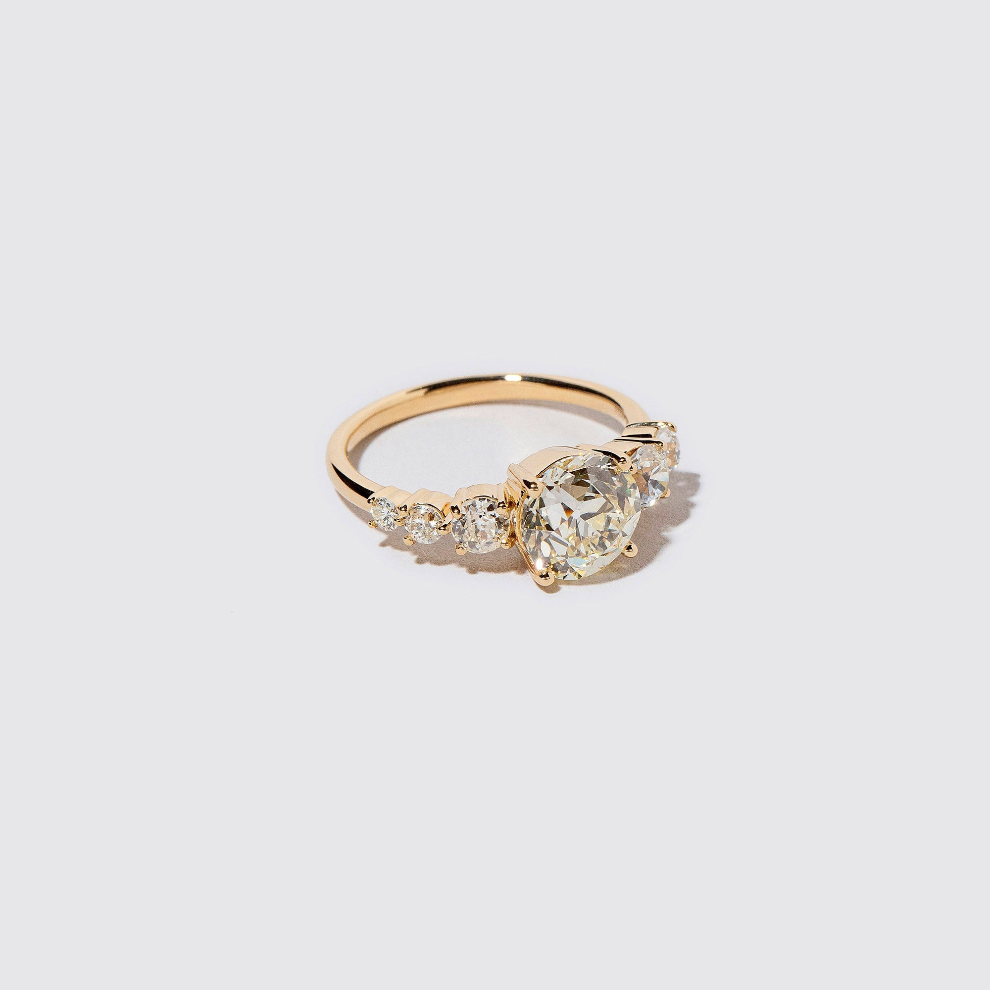 product_details::Auriga Ring - White Diamond on light color background.