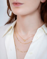 Be Good Necklace on model.