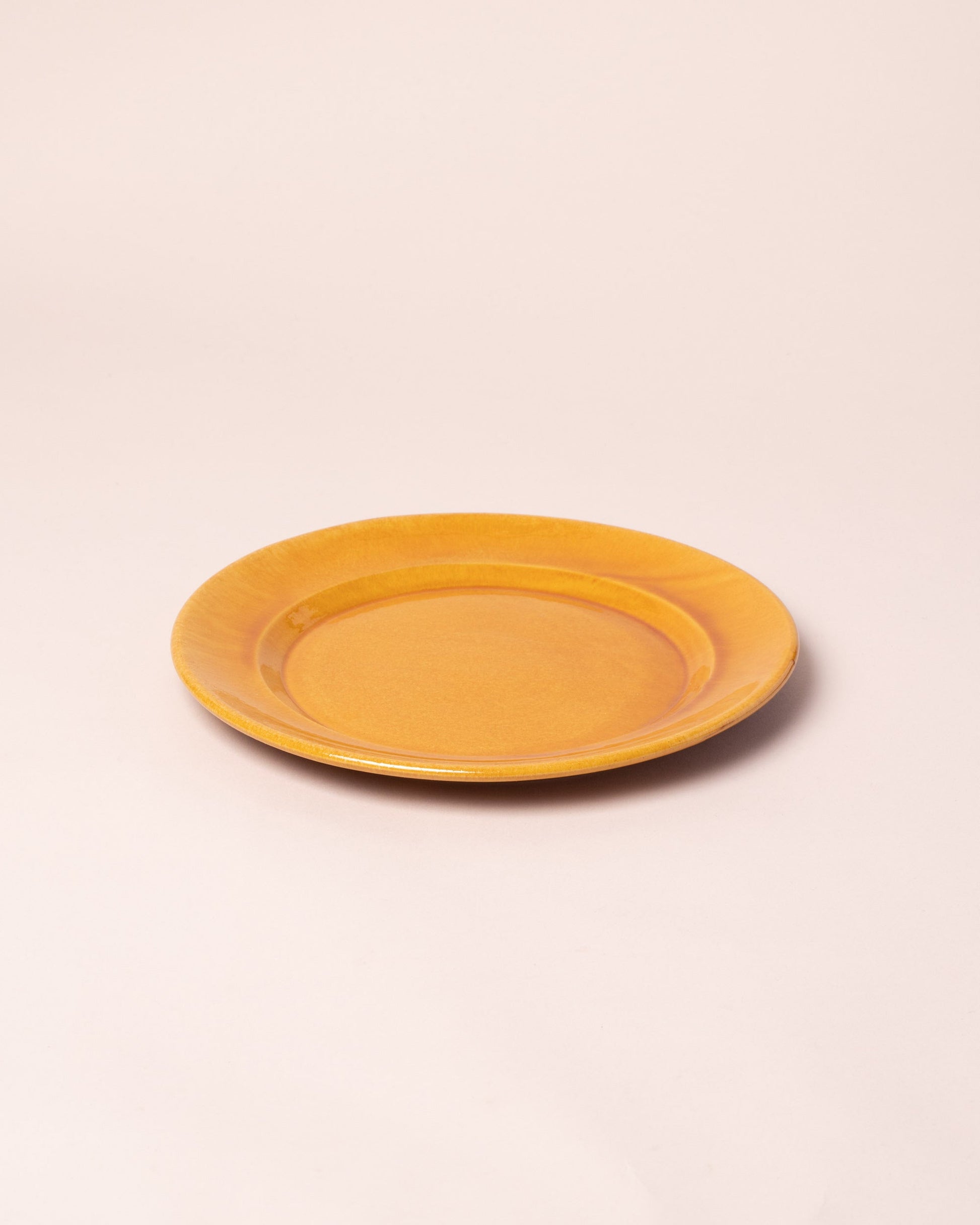 La Ceramica Vincenzo Del Monaco Caramel Yellow Large Dish on light color background.