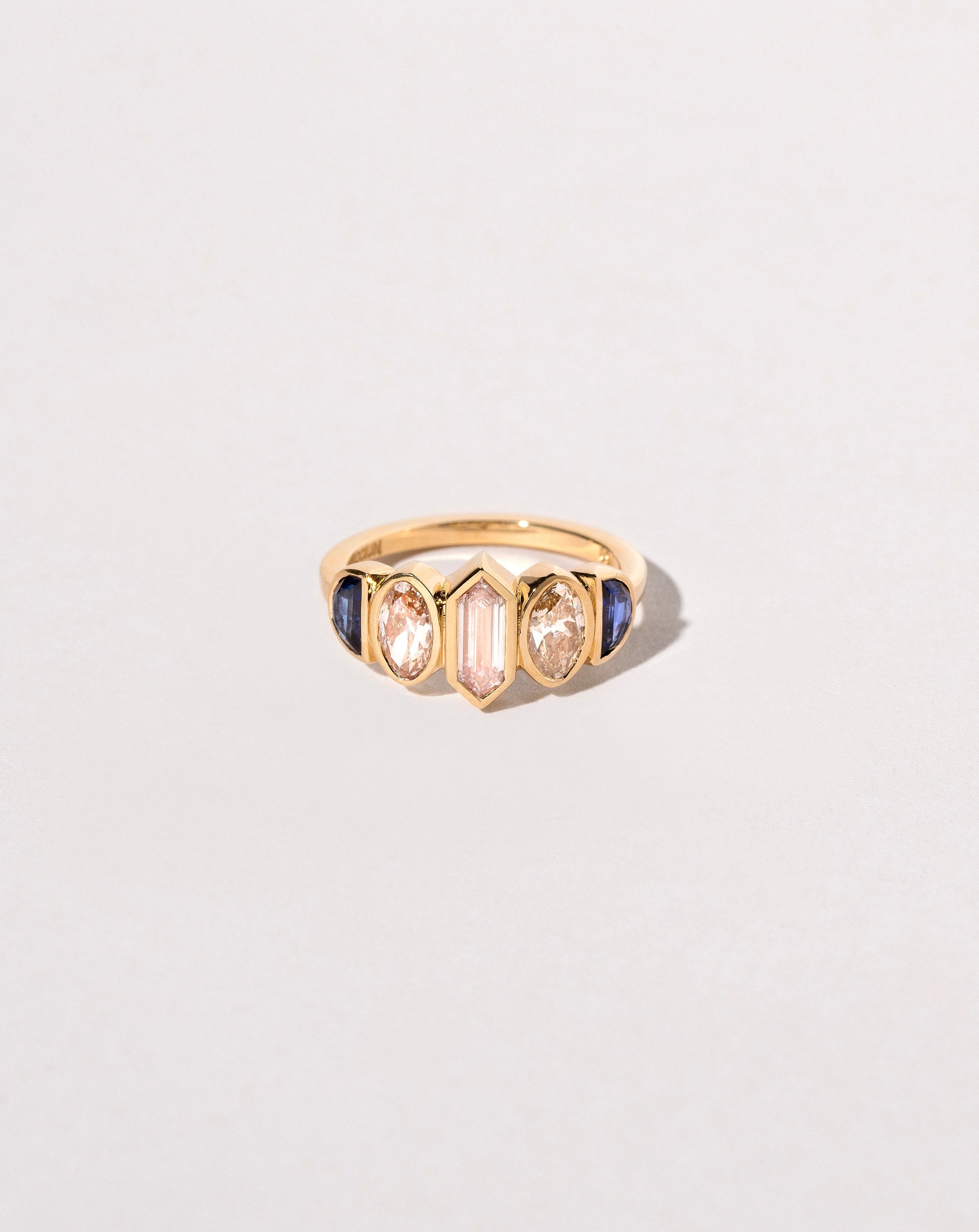  Larkspur Ring on light color background.