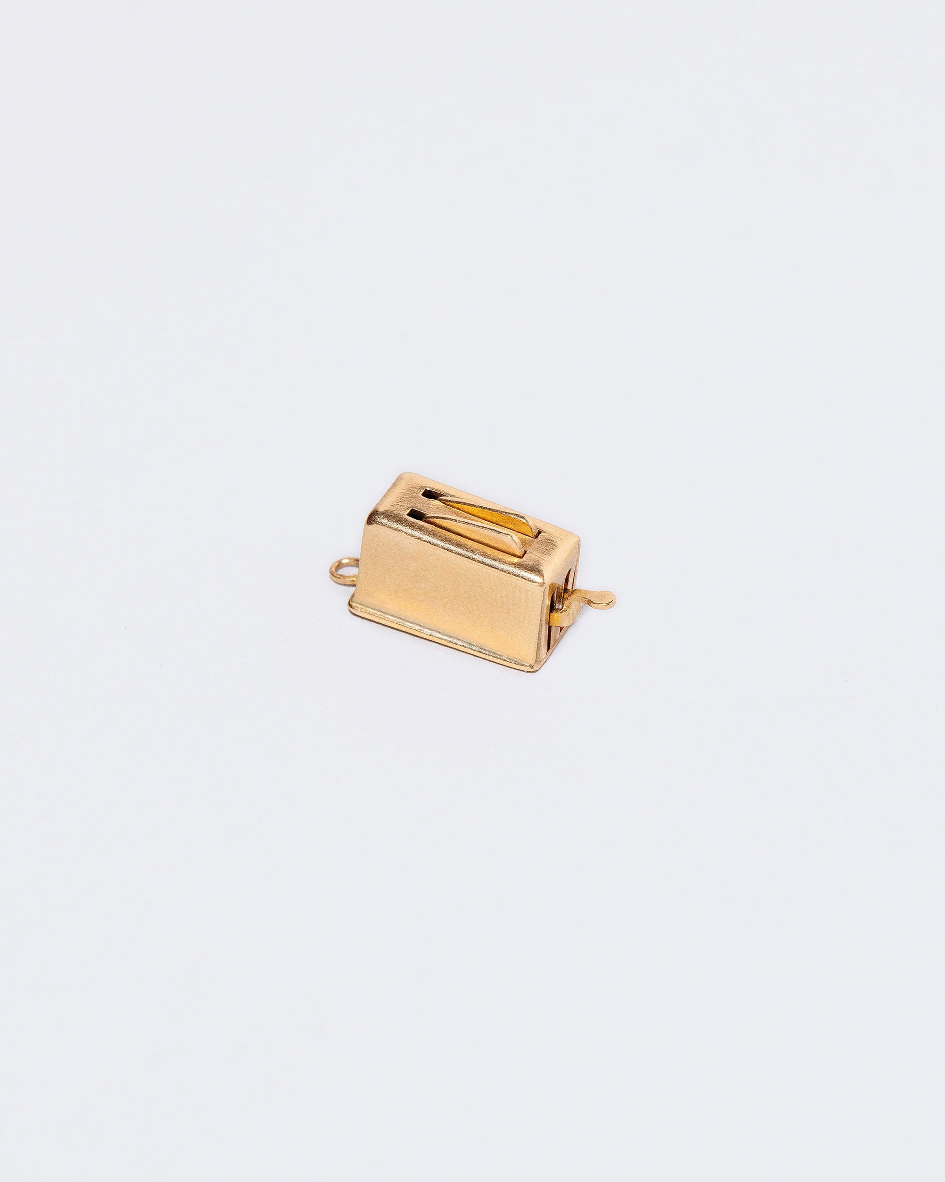  Toaster Charm on light color background.