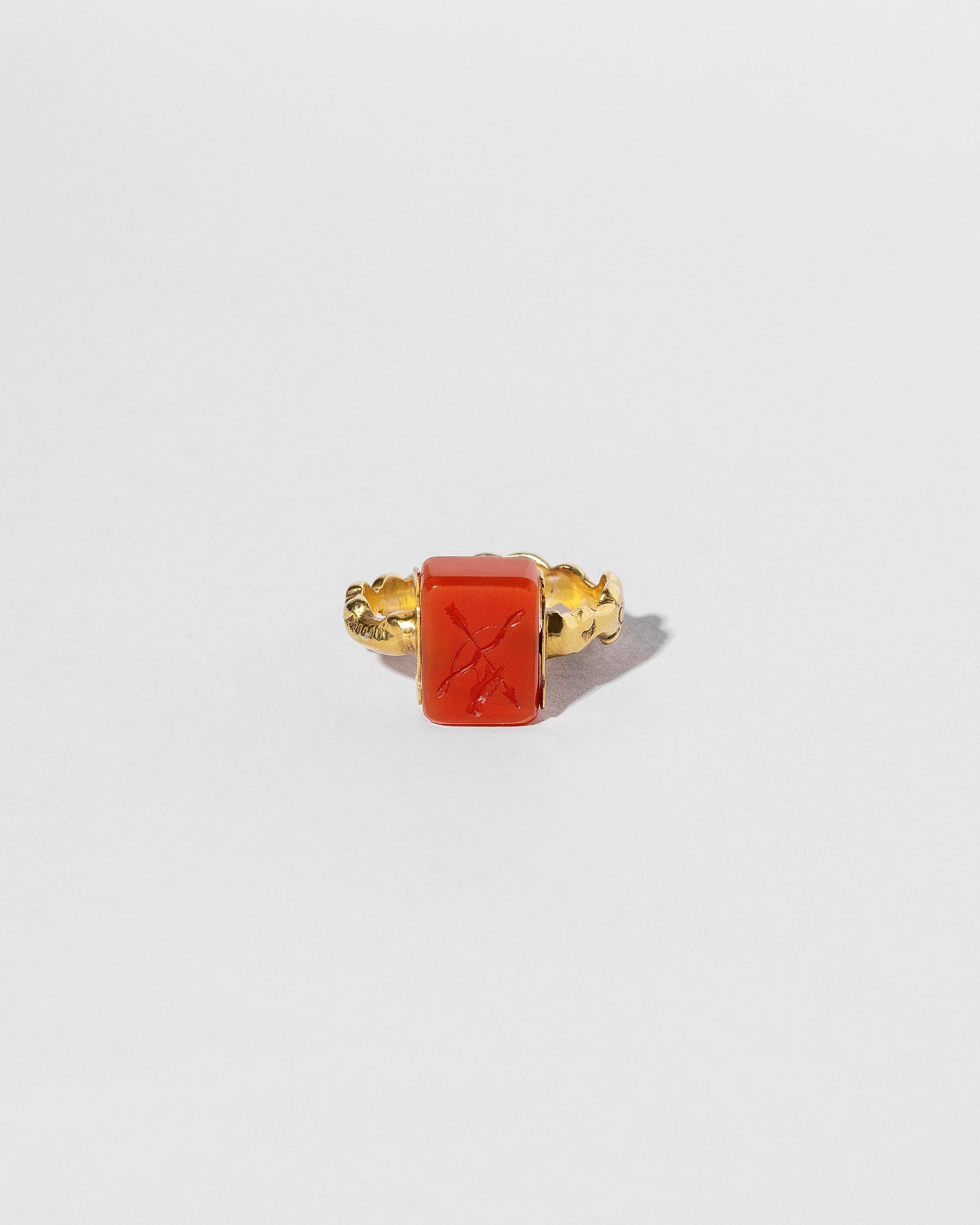 Antique Carnelian Flip Ring on light color background.