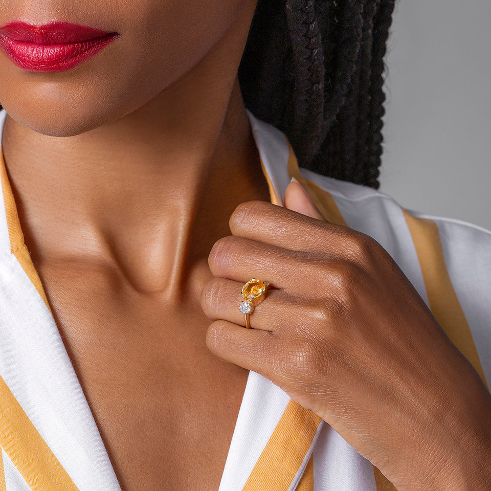 product_details::Ethy Ring on model.