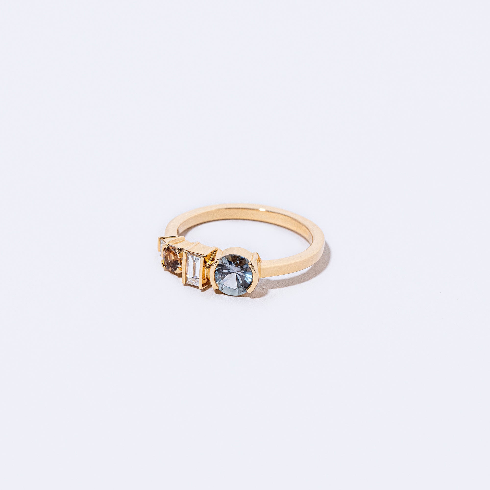 product_details:: Occam's Ring on light color background.