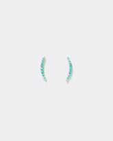 Crescent Ear Climber Stud Earrings - Turquoise on a light background.