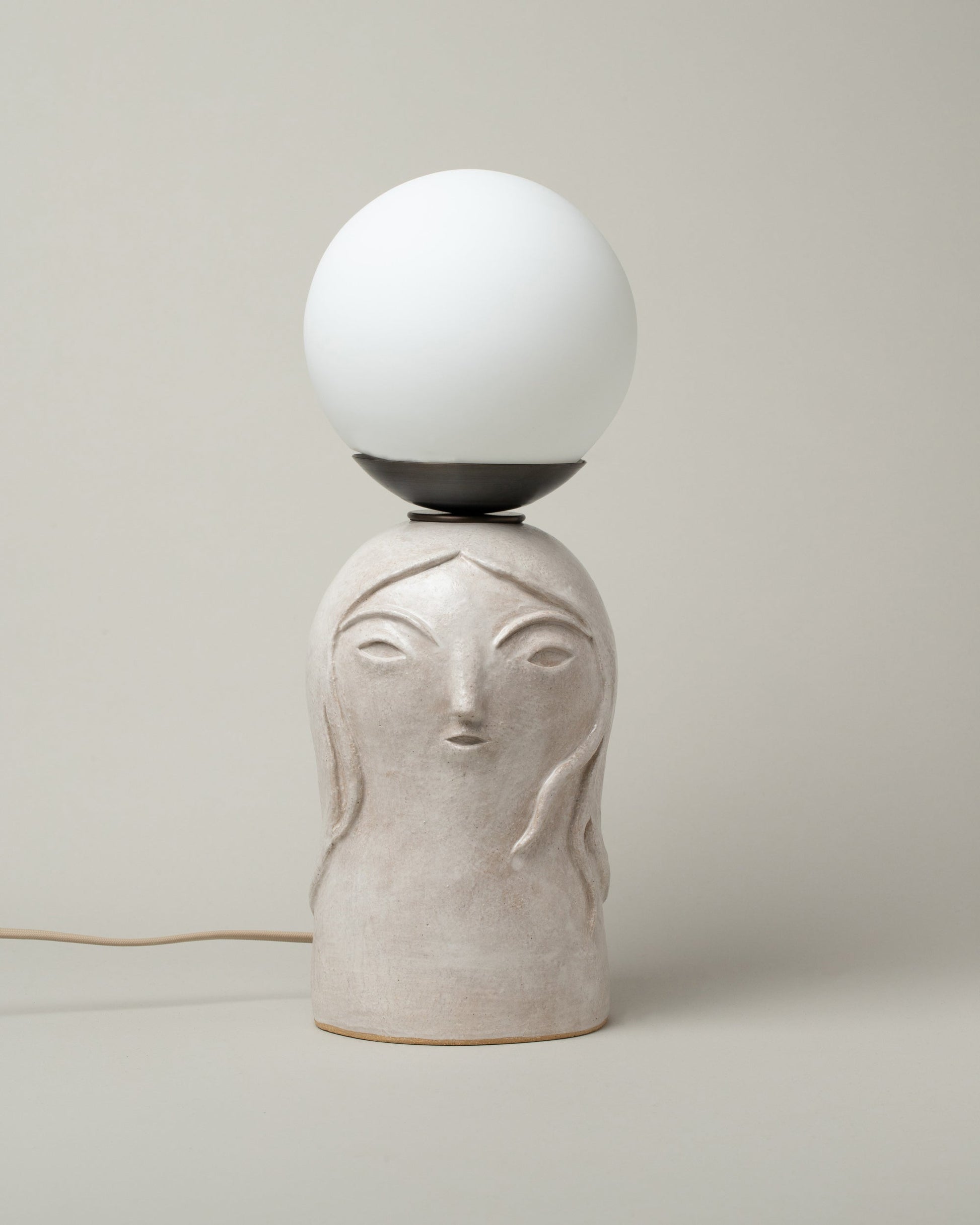 Rami Kim Large / White Floating Penelope Table Lamp on light color background.