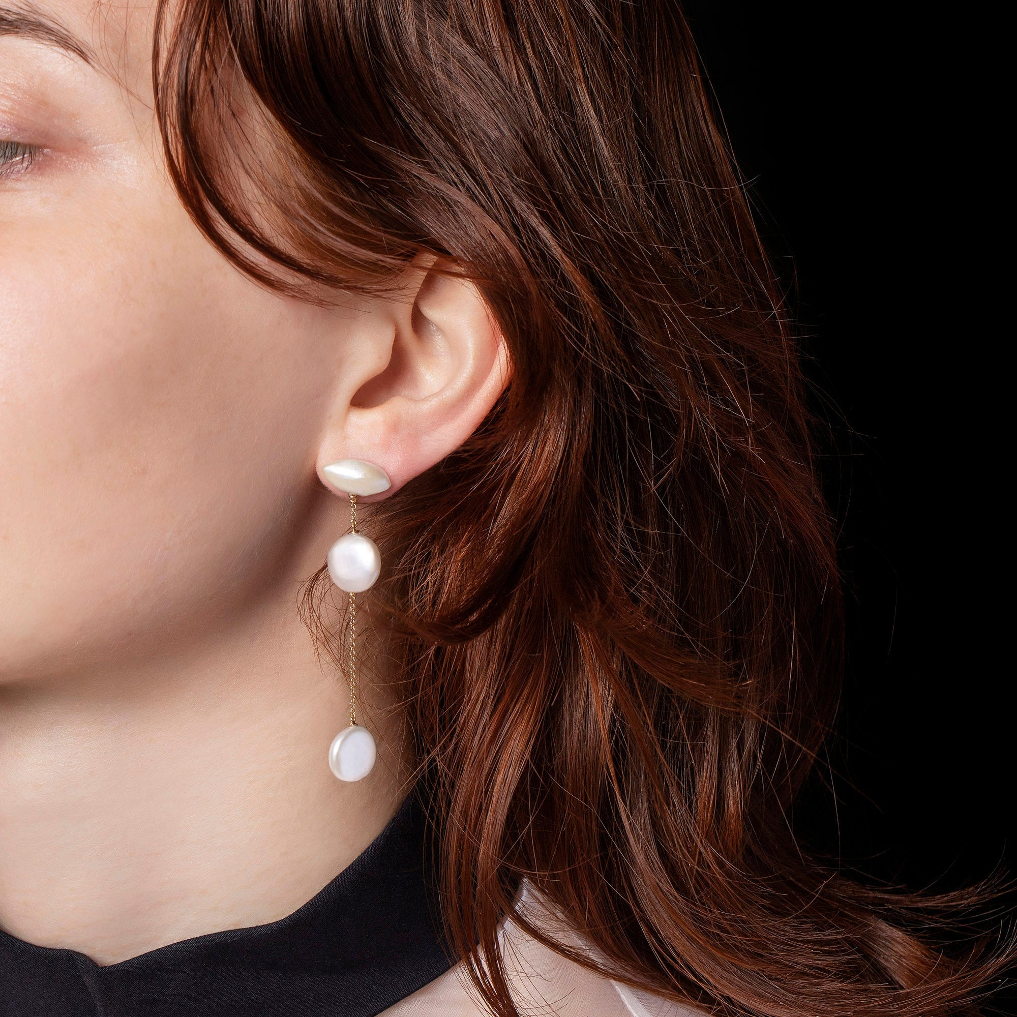 product_details::Idas Earrings on model.