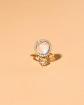  Moonstone & Diamond Cluster Ring on light color background.