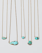Group of Turquoise Necklaces on light colored background.
