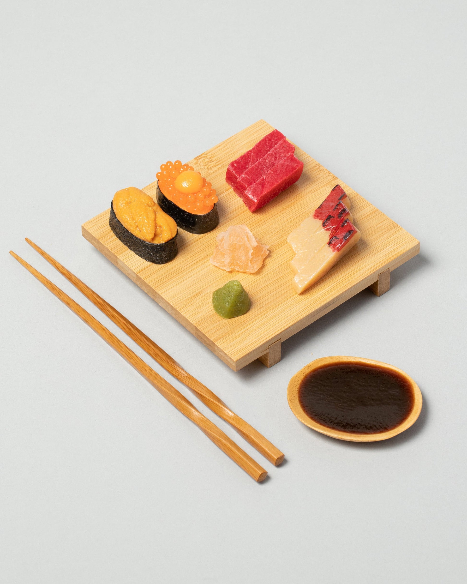 Spills Roe Board Sushi Board on light color background.