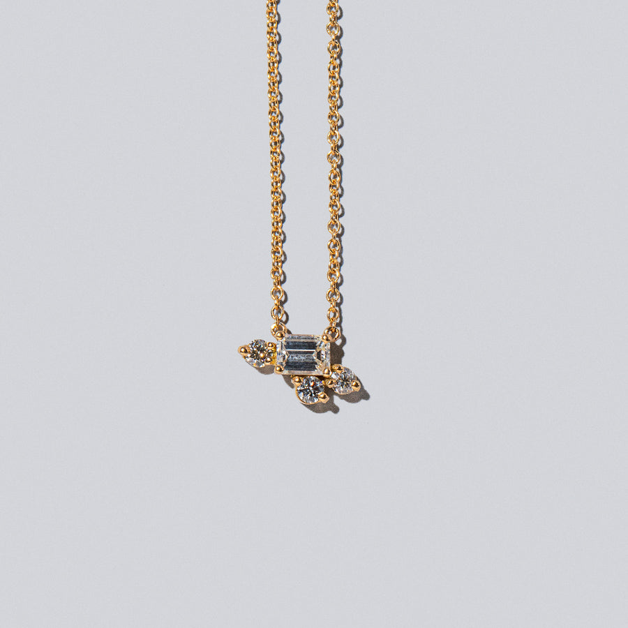product_details:: Cosmic Dawn Necklace - White Diamonds on light color background.