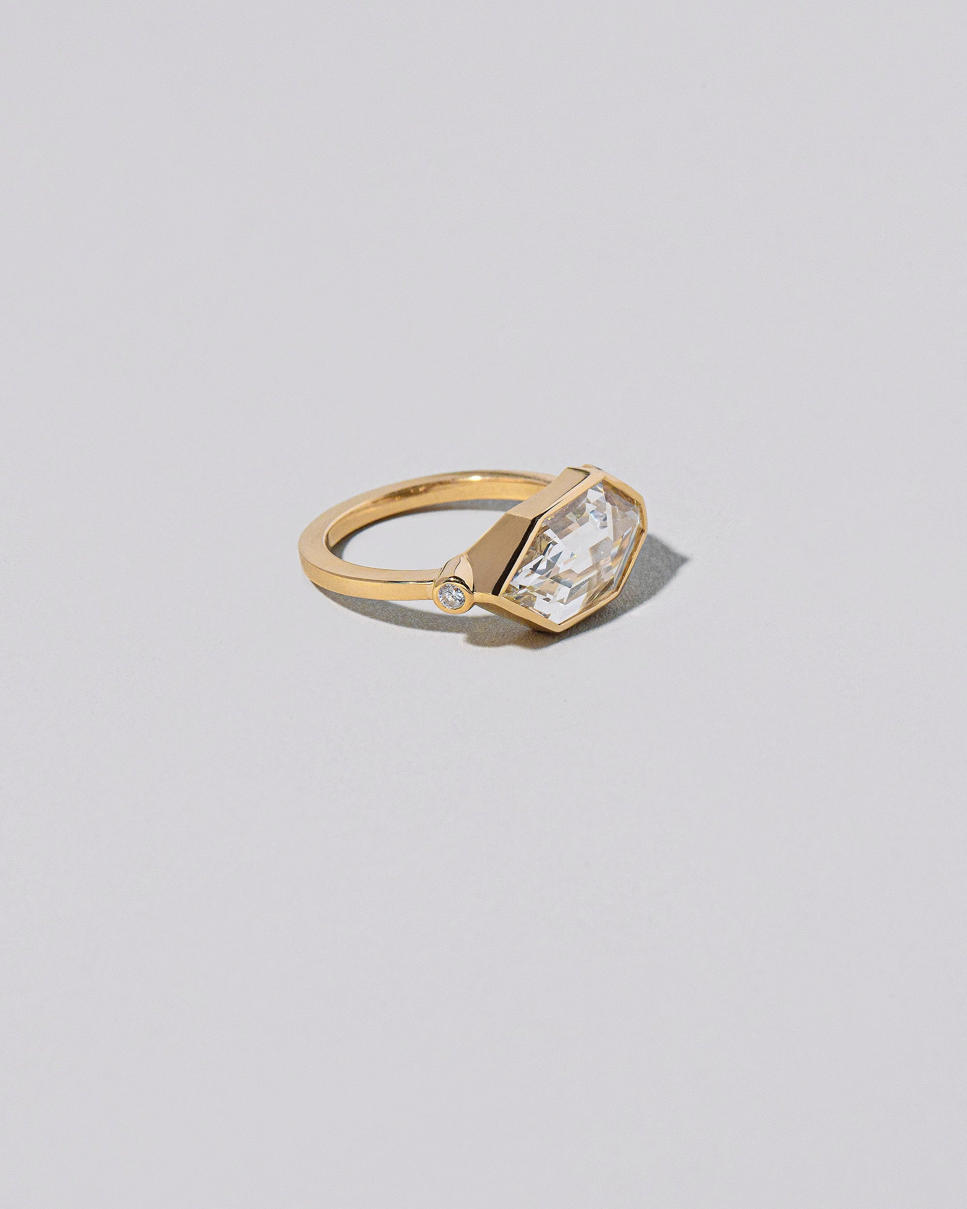  Okama Ring on light color background.