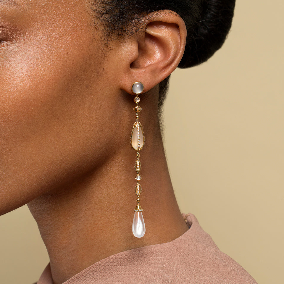 product_details::The Future Moonstone Drop Earrings on model.