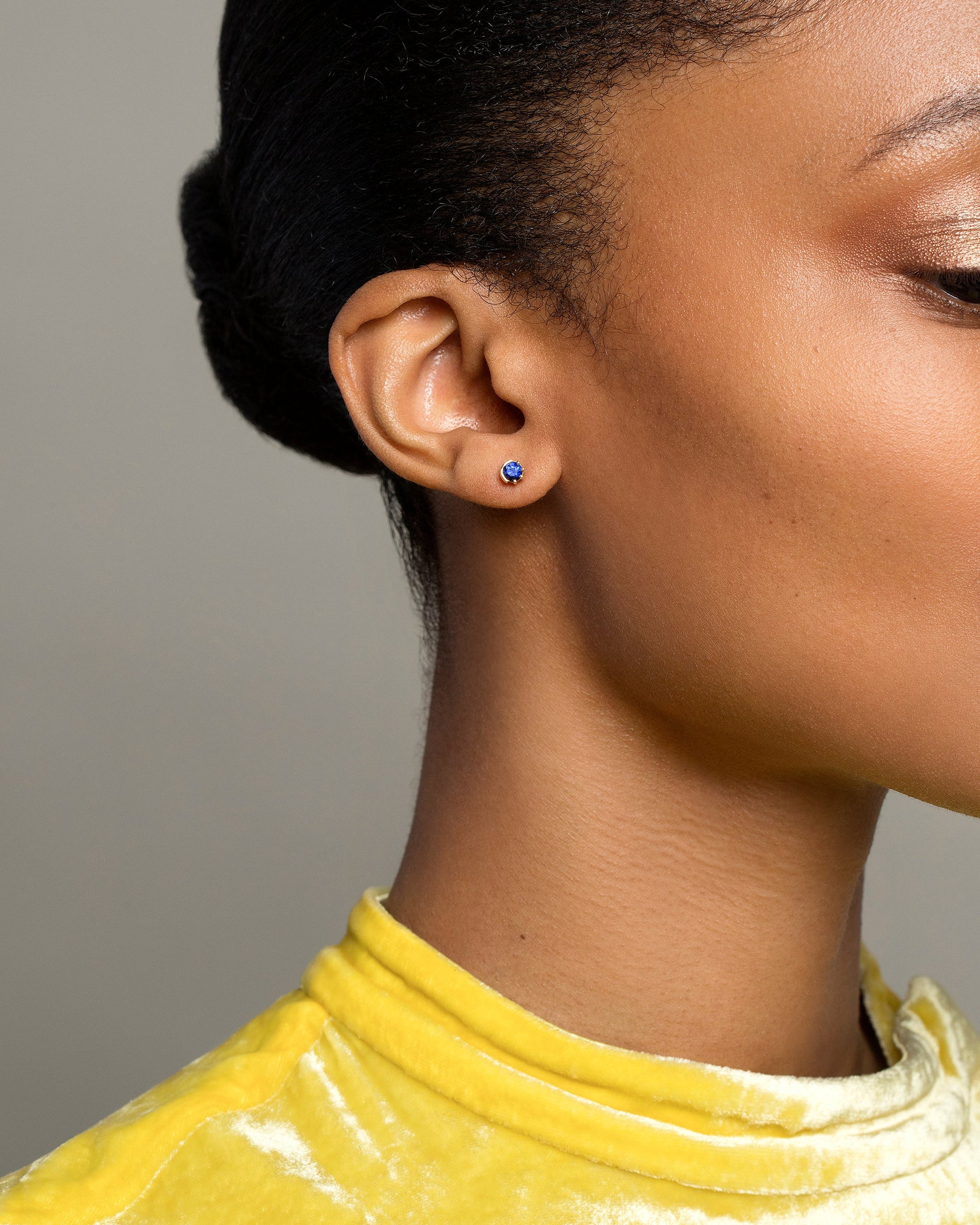 Sapphire Sun & Moon Stud Earrings on model.